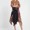 Asymmetrische uitlopende patchworkrok