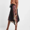 Asymmetrische uitlopende patchworkrok