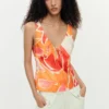 Blouse met bloembladbandjes