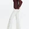 Flared jeans with frayed edges