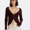 Flared jeans with frayed edges