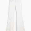 Flared jeans with frayed edges