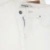 Flared jeans with frayed edges