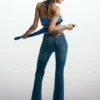 Flared jeans with frayed edges