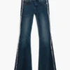 Flared jeans with frayed edges