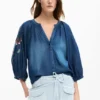 Geborduurde ballonblouse