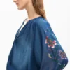 Geborduurde ballonblouse
