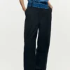 Getailleerde broek in combinatie