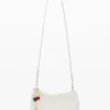 Grote crossbody-portemonnee met bedeltjes