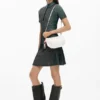 Grote crossbody-portemonnee met bedeltjes