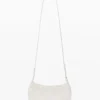 Grote crossbody-portemonnee met bedeltjes