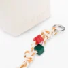Grote crossbody-portemonnee met bedeltjes