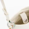 Grote crossbody-portemonnee met bedeltjes