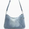 Grote denim tas met bedeltjes