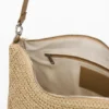 Grote raffia tas met bedeltjes