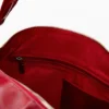Grote tas met logo-bedeltje