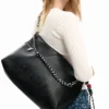 Grote tas met logo-bedeltje