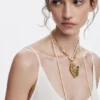 Hangers met meerdere posities, vergulde schelp van Zalio