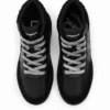 Hoge sneakers van imitatieschapenvacht
