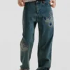 Jeans met Disney™-patches