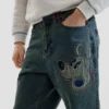 Jeans met Disney™-patches