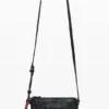 Kleine crossbodytas met bedeltje