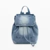 Kleine denim rugzak met bedeltjes