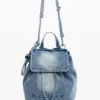Kleine denim rugzak met bedeltjes