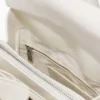 Kleine rugzakken met bedeltjes