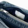 Middelgrote denim tas met bedeltjes