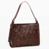 Middelgrote gevlochte tas