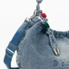 Middelgrote ovale tas met bedeltjes