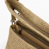 Middelgrote raffia tas met bedeltjes