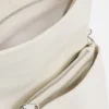 Middelgrote tas met bedeltjes