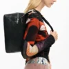 Middelgrote tas met borduursel