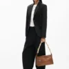 Middelgrote tas met borduursels