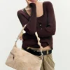 Middelgrote tas met borduursels