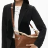Middelgrote tas met borduursels