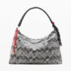 Middelgrote tas met studs-bedeltje