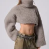 Set met cropped trui en muts