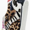 Sneakers met patchwork en dierenprint