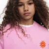 Sweatshirt met geborduurde zon
