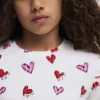 T-shirt met lange mouwen en hartjes