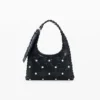 Tassen van imitatieleer met studs