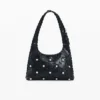 Tassen van imitatieleer met studs