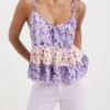 Top met bloemenprint en bandjes